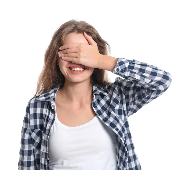 Young woman covering her eyes on white background — Stock Photo, Image
