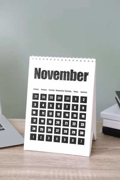 Calendar on table in office — Stock Photo, Image