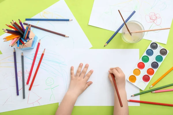 Cute little child drawing at table, top view — Stock Photo, Image