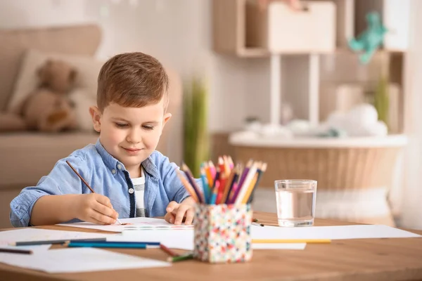 Cute little boy painting at home — Stock Photo, Image