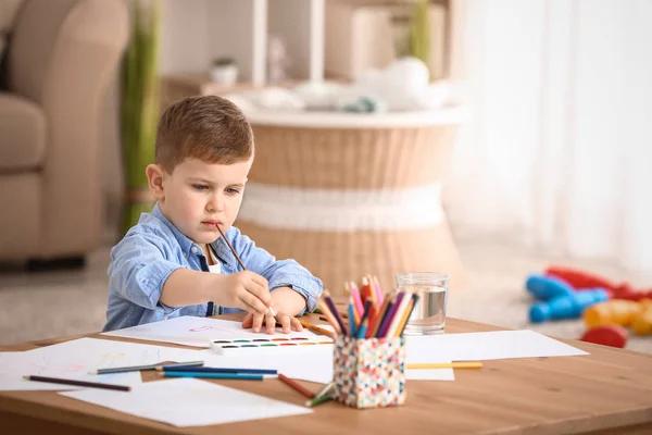 Cute little boy painting at home — Stock Photo, Image