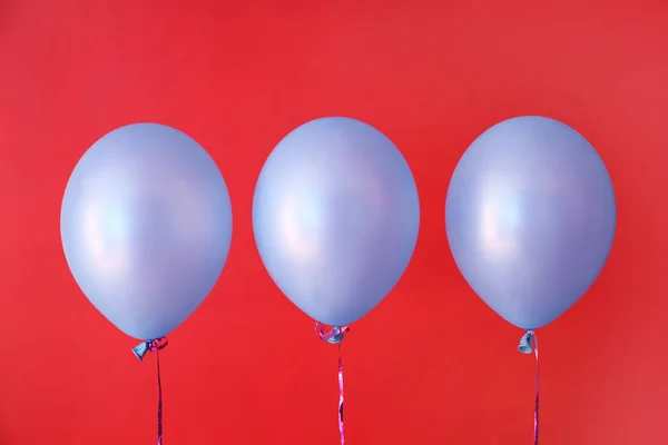 Air balloons on color background — Stock Photo, Image