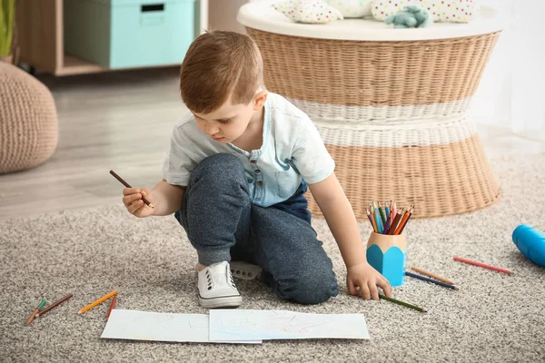 Cute little boy drawing at home — Stock Photo, Image