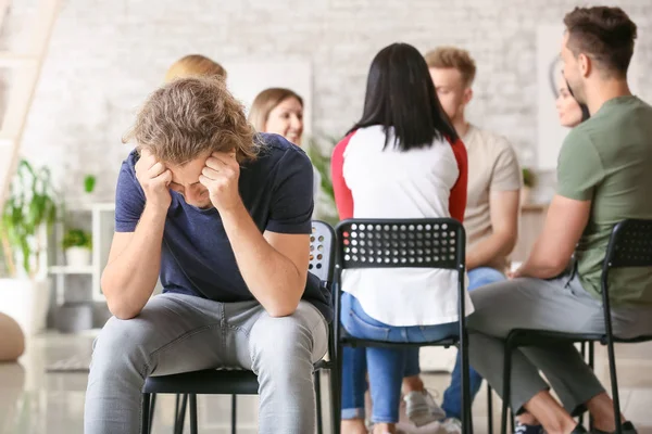 Depressed man at group therapy session — Stock Photo, Image