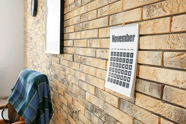 Flip calendar hanging on wall — Stock Photo, Image