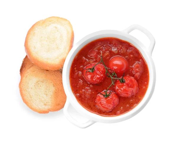 Pot of tasty tomato cream soup and bread on white background — Stock Photo, Image