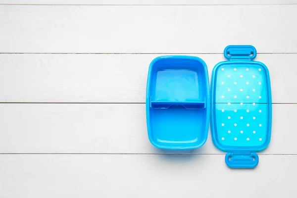 Plastic lunch box on white wooden background — Stock Photo, Image