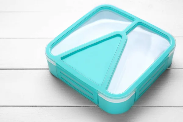 Caja de almuerzo de plástico sobre fondo de madera blanca —  Fotos de Stock