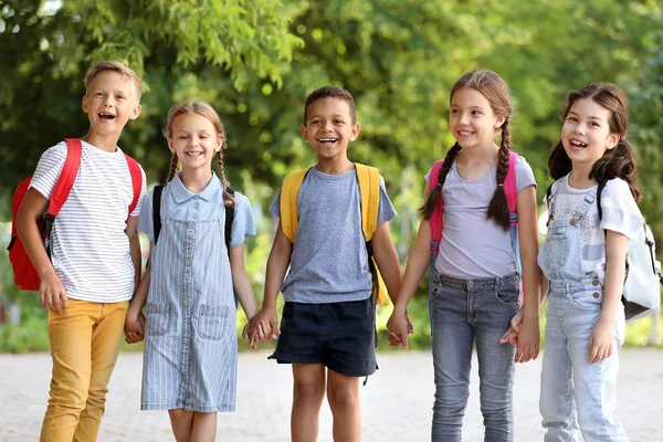 Group of cute little pupils outdoors — Stock Photo, Image