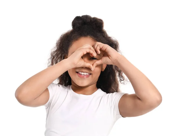 African-American girl making heart with her hands on white background — Stock Photo, Image