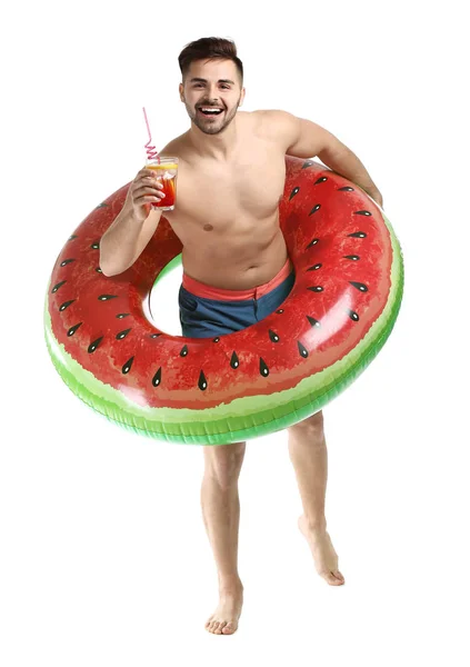 Happy young man with inflatable ring and cocktail on white background — Stock Photo, Image