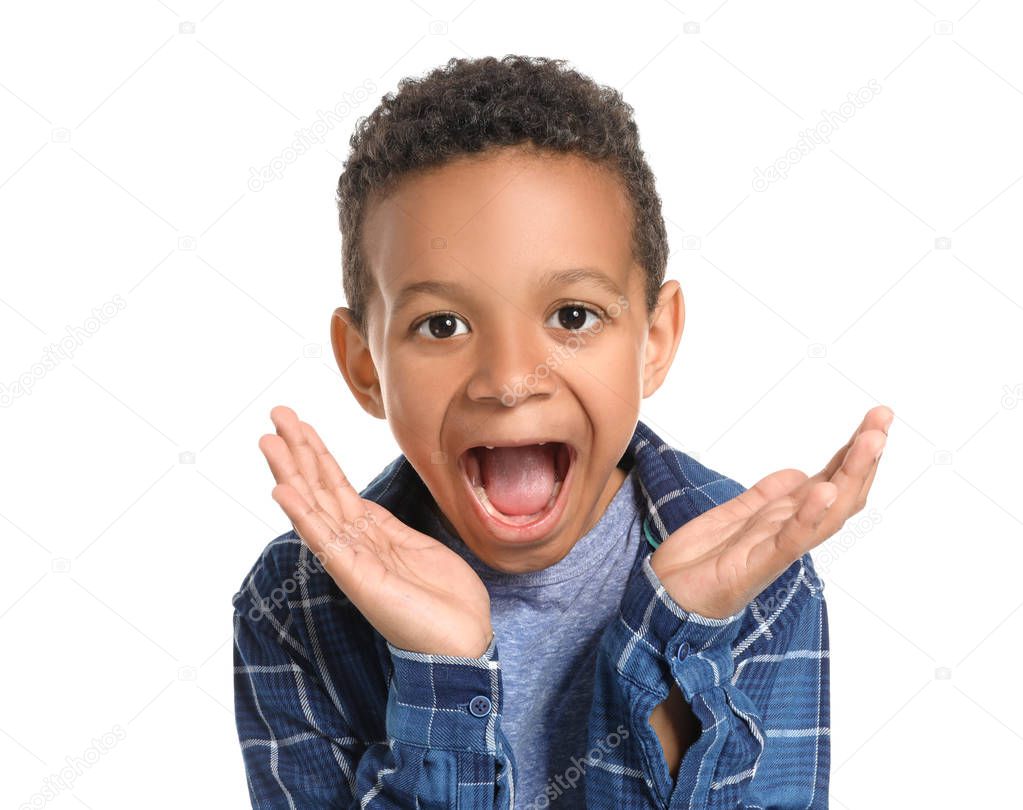 Funny African-American boy on white background