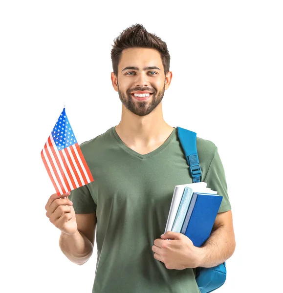 Estudiante masculino con bandera de Estados Unidos sobre fondo blanco — Foto de Stock