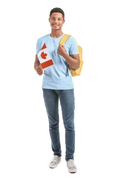 Estudiante afroamericano con bandera canadiense sobre fondo blanco — Foto de Stock