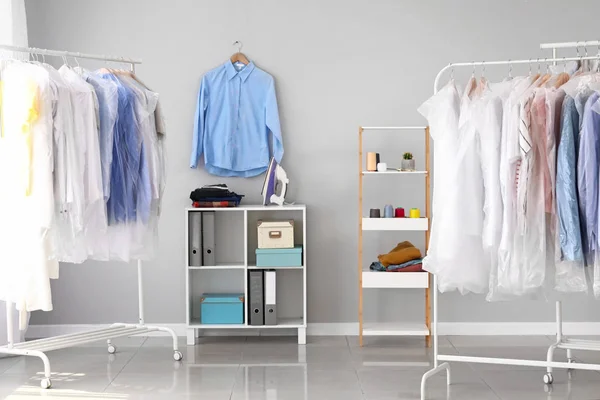 Interior of modern dry-cleaner's — Stock Photo, Image