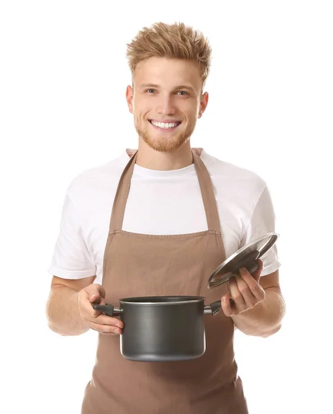 Schöner männlicher Koch mit Suppe auf weißem Hintergrund — Stockfoto