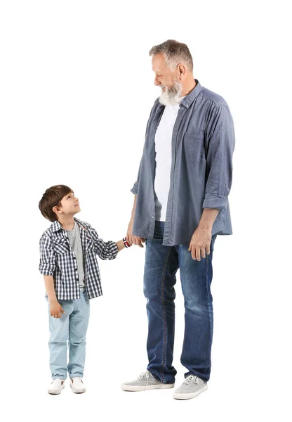 Menino bonito com avô no fundo branco — Fotografia de Stock