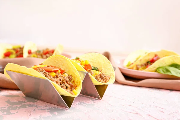 Stand with tasty fresh tacos on table — Stock Photo, Image