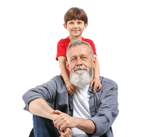 Cute little boy with grandfather on white background — Stock Photo, Image