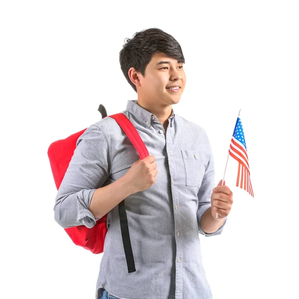 Student asijského pohlaví s vlajkou USA na bílém pozadí — Stock fotografie