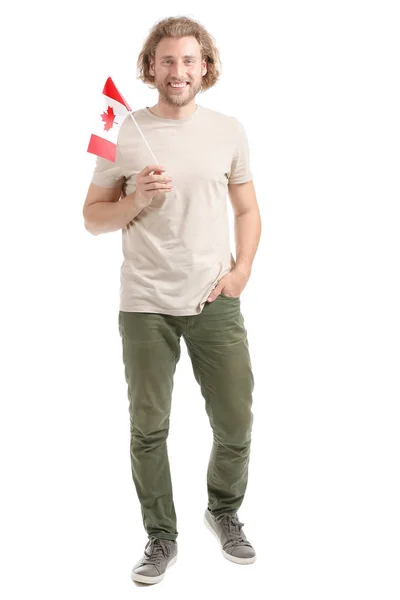 Fiatal férfi a kanadai zászló fehér háttér — Stock Fotó