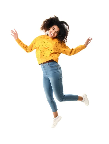 Jumping African-American woman on white background — Stock Photo, Image