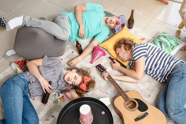 Young people sleeping after party at home