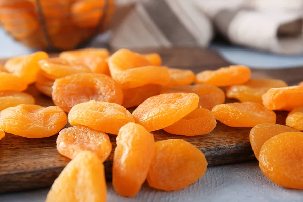 Tasty dried apricots on table, closeup — Stock Photo, Image