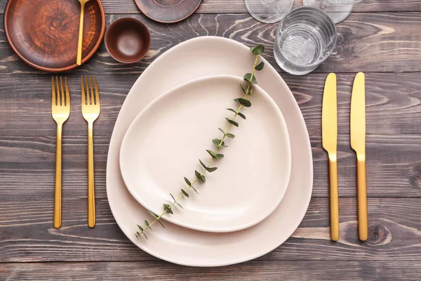 Beautiful table setting on wooden background — Stock Photo, Image