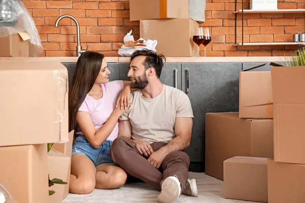 Happy young couple after moving into new house — Stock Photo, Image