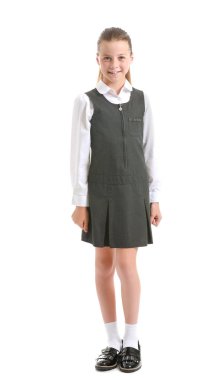 Beyaz arka planda küçük tatlı bir kız öğrenci.