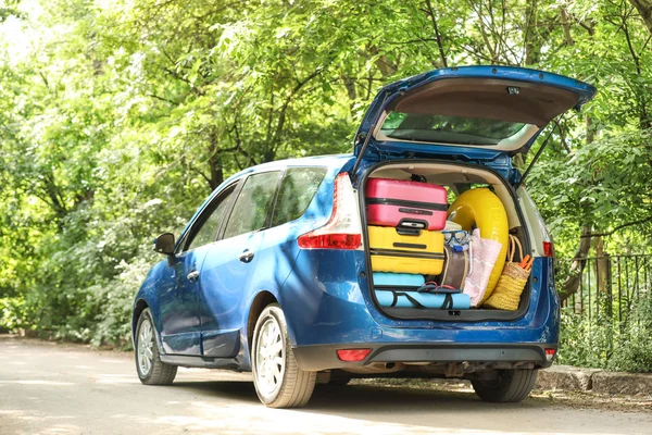 Modern car with luggage outdoors — Stock Photo, Image