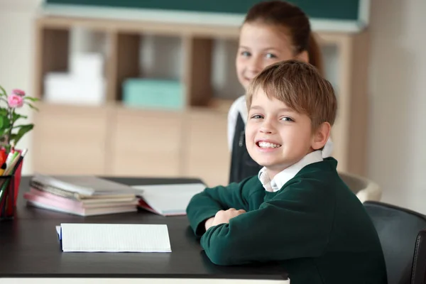 Cute little children during lesson in classroom — Stock Photo, Image