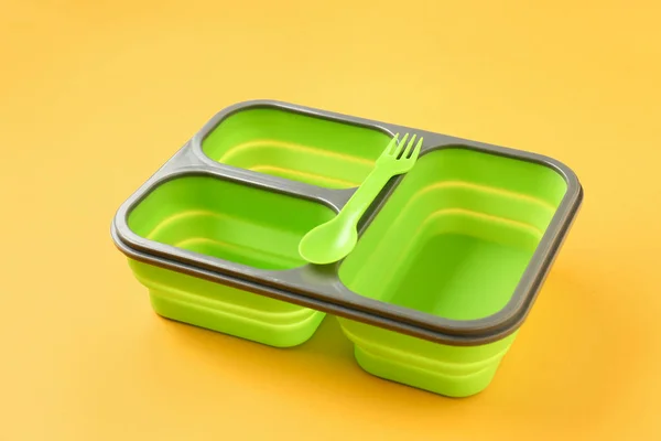 Plastic lunch box on color background — Stock Photo, Image