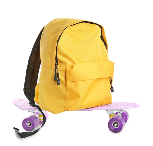 School backpack with skateboard on white background