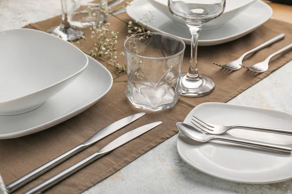 Beautiful table setting on grey background — Stock Photo, Image