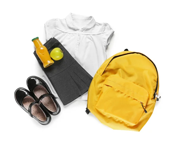 Stylish school uniform with backpack on white background — Stock Photo, Image