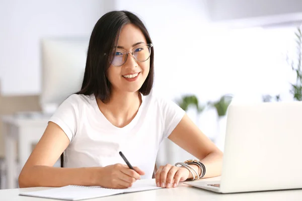Young Asian student preparing for exam in university — Stock Photo, Image