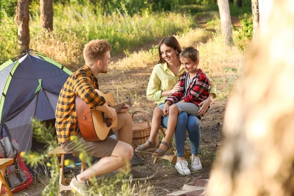 Happy family spending weekend in forest — Stock Photo, Image