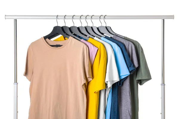 Rack with hanging clothes on white background — Stock Photo, Image