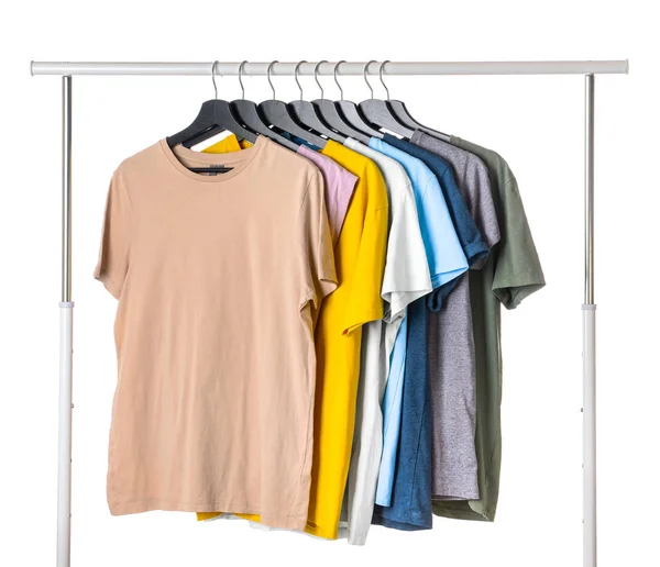 Rack with hanging clothes on white background — Stock Photo, Image