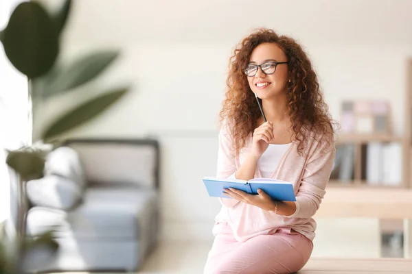 Young African-American student preparing for exam — Stock Photo, Image