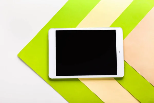 Modern tablet computer on color background — Stock Photo, Image