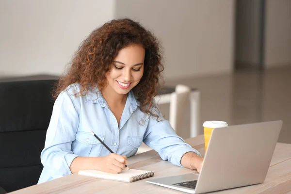 Young African-American student preparing for exam Stock Image