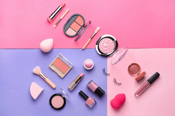 Set of makeup cosmetics on color background — Stock Photo, Image