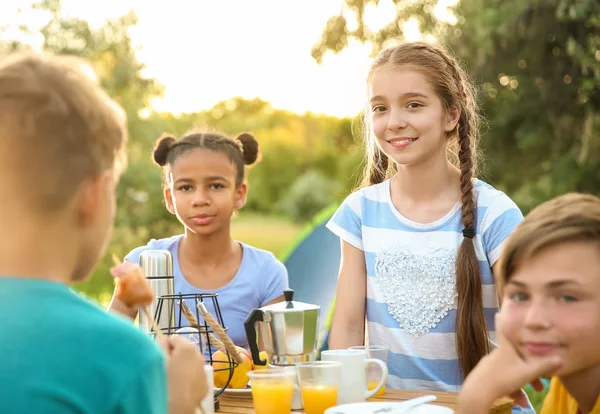 Group of children having picnic on summer day — Stock Photo, Image