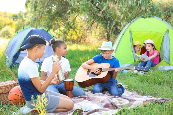 Group of children resting at summer camp — Stock Photo, Image
