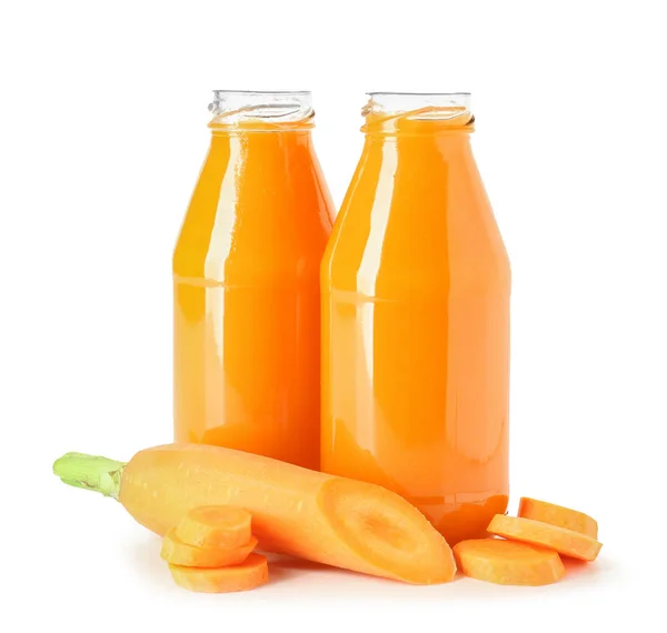 Bottles of fresh carrot juice on white background — Stock Photo, Image