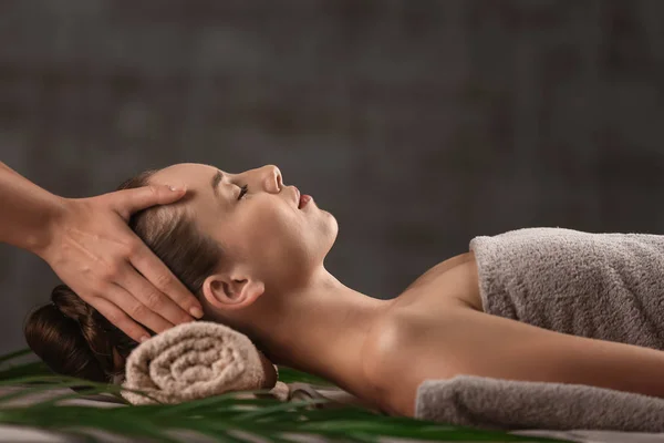 Young woman having massage in spa salon — Stock Photo, Image