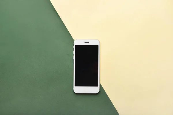 Modern mobile phone on color background — Stock Photo, Image